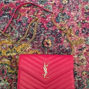 Yves Saint Laurent envelope wallet on a chain